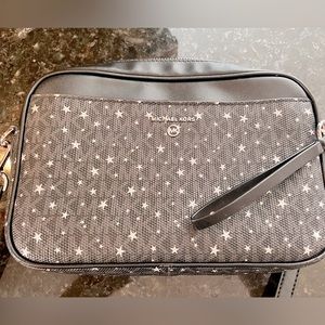 Michael Kors Crossbody purse. Star pattern.